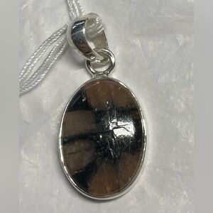 Andalusite pendant (cross stone)